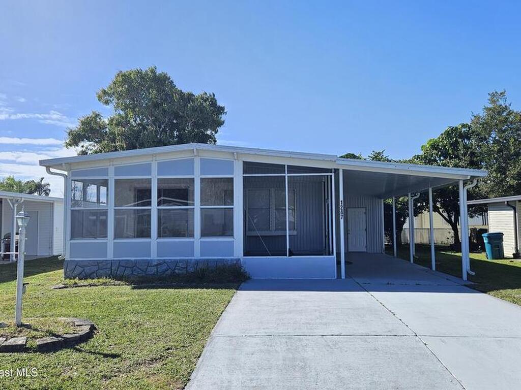 1247 Waterway Drive, Barefoot Bay, FL 32976