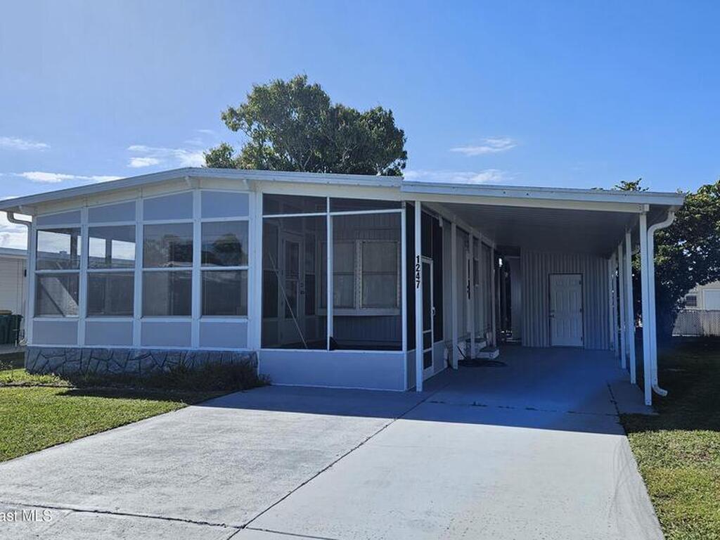 1247 Waterway Drive, Barefoot Bay, FL 32976