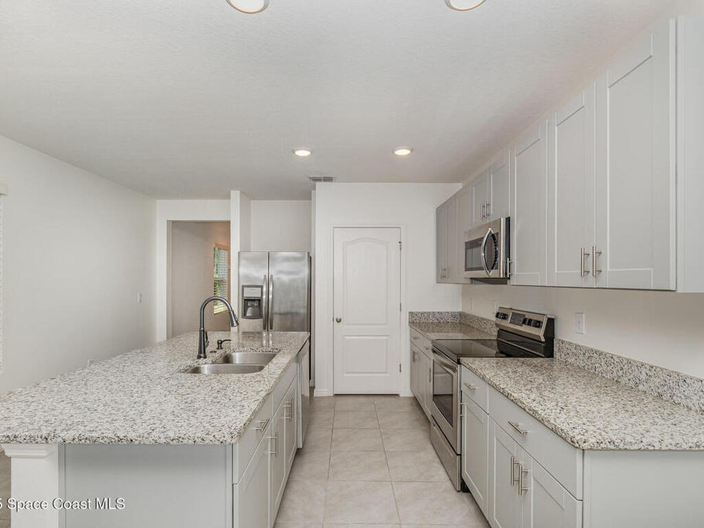 213 Caryota Court, New Smyrna Beach, FL 32168