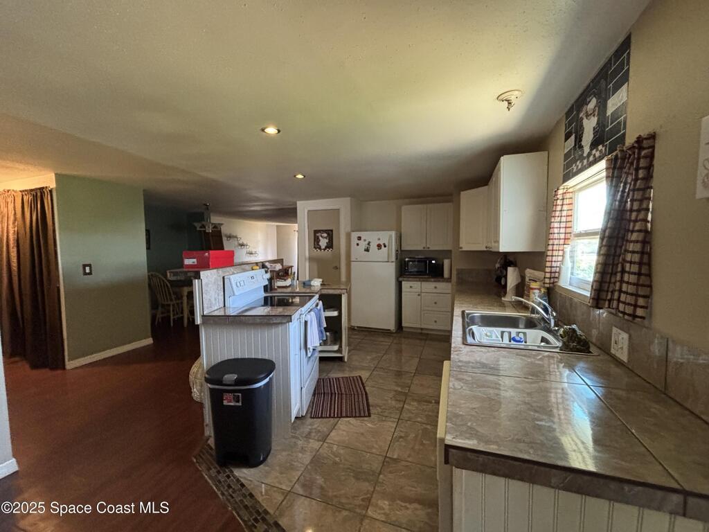 1161 Waterway Drive, Barefoot Bay, FL 32976