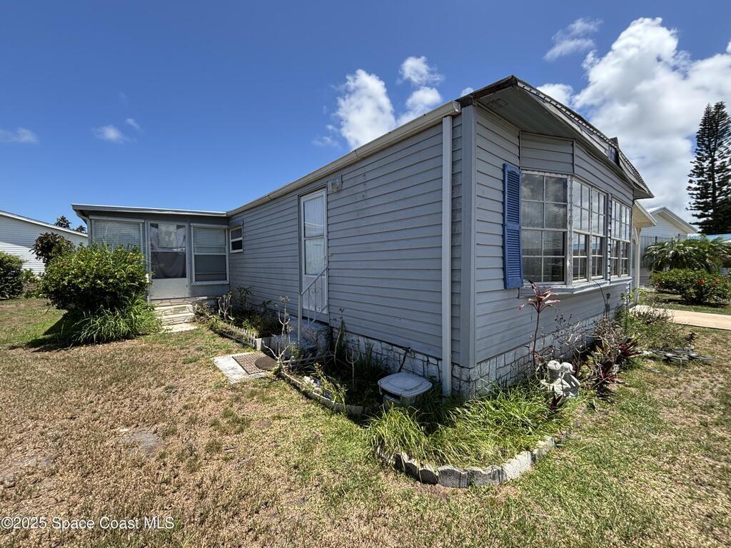1161 Waterway Drive, Barefoot Bay, FL 32976