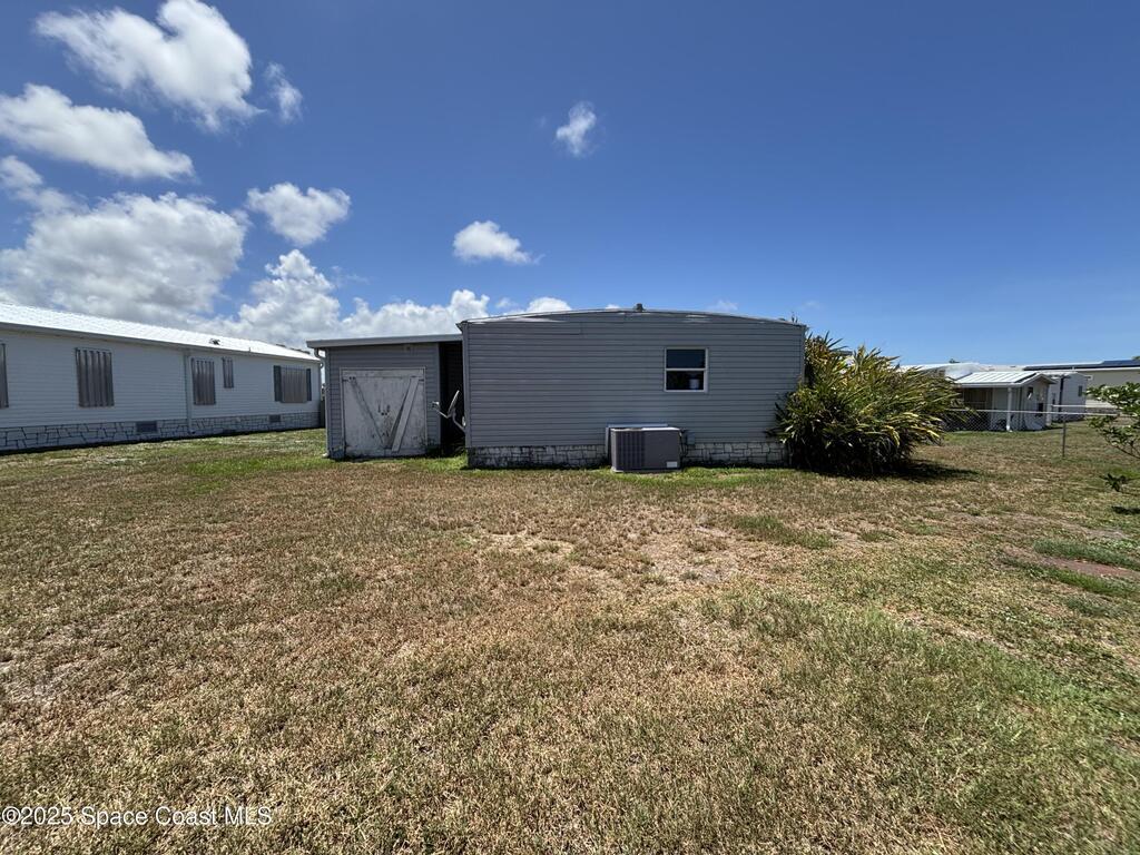 1161 Waterway Drive, Barefoot Bay, FL 32976