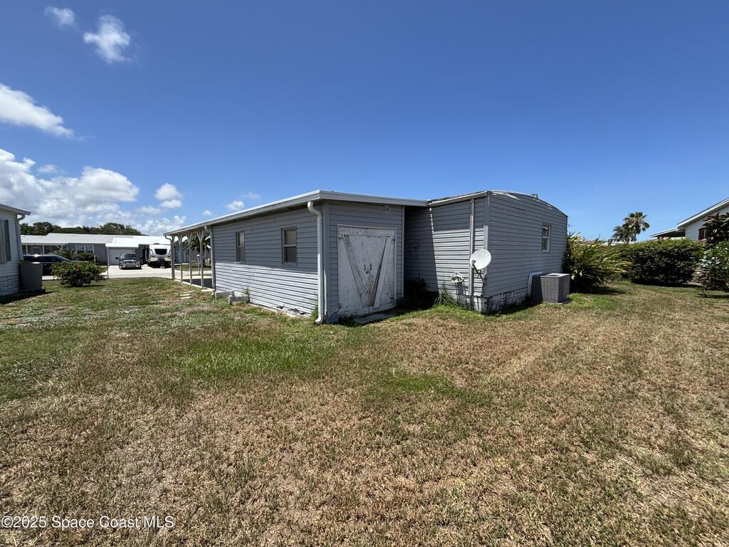 1161 Waterway Drive, Barefoot Bay, FL 32976