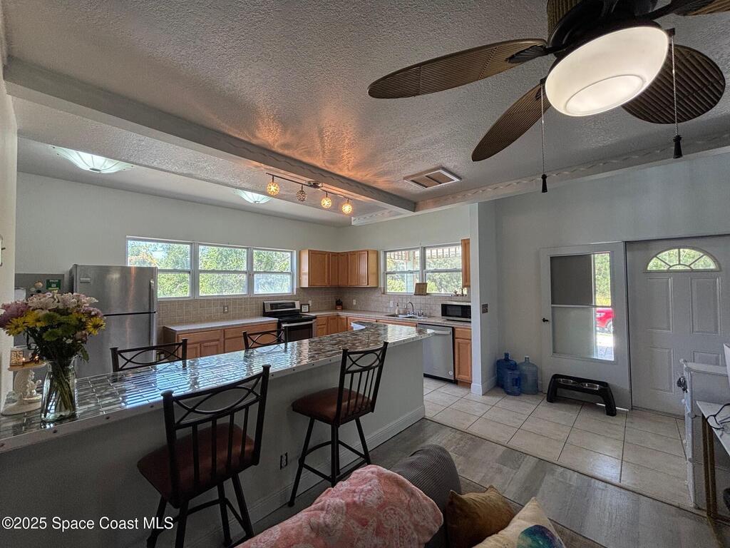 9590 Primrose Drive, Micco, FL 32976