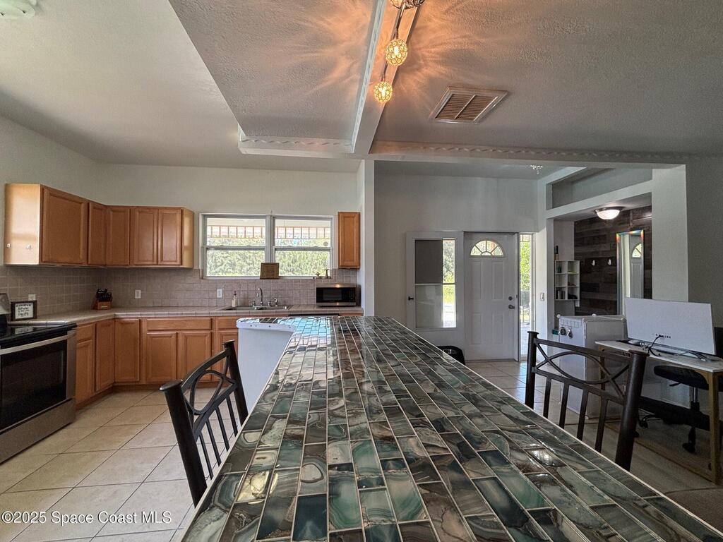 9590 Primrose Drive, Micco, FL 32976