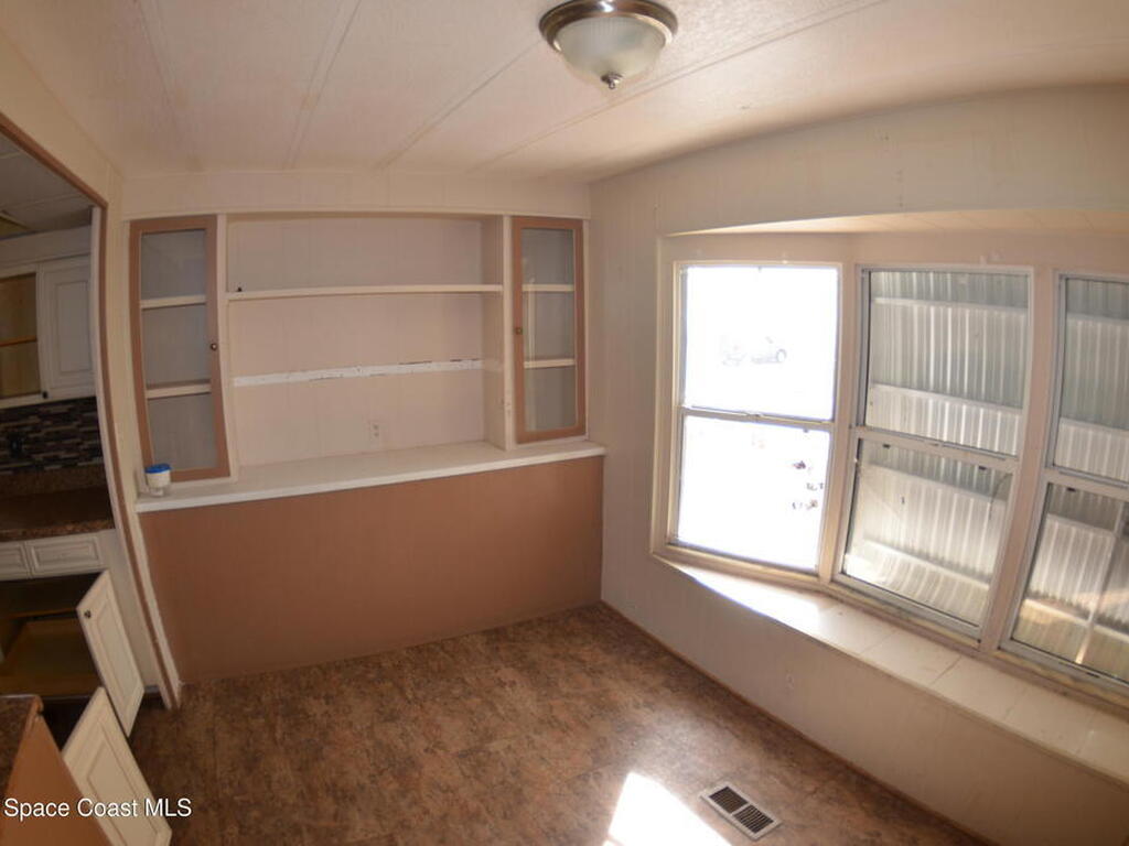 1056 Wren Circle, Barefoot Bay, FL 32976