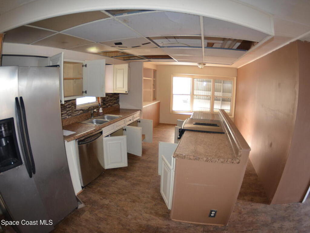 1056 Wren Circle, Barefoot Bay, FL 32976