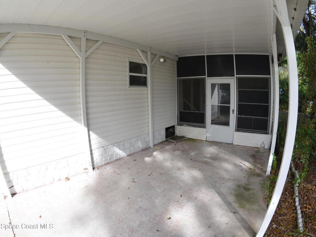 1056 Wren Circle, Barefoot Bay, FL 32976