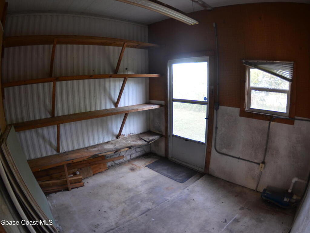 1056 Wren Circle, Barefoot Bay, FL 32976