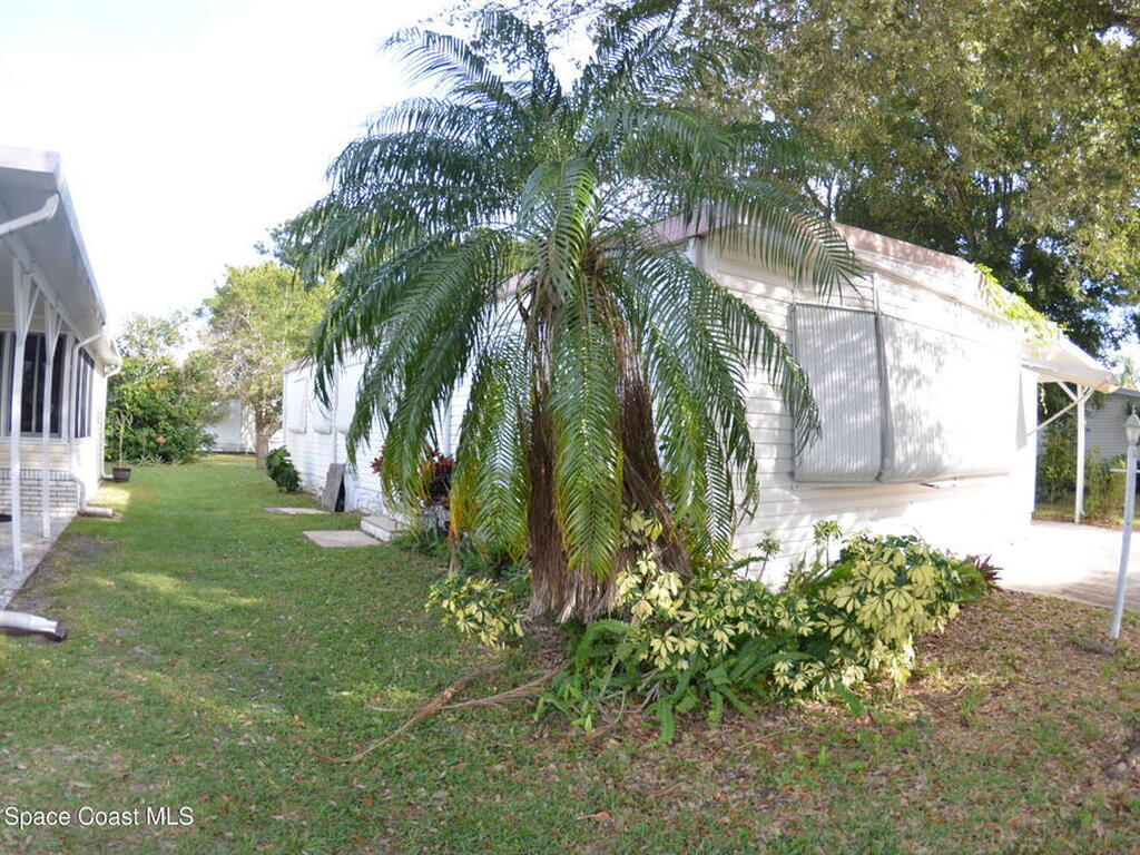 1056 Wren Circle, Barefoot Bay, FL 32976