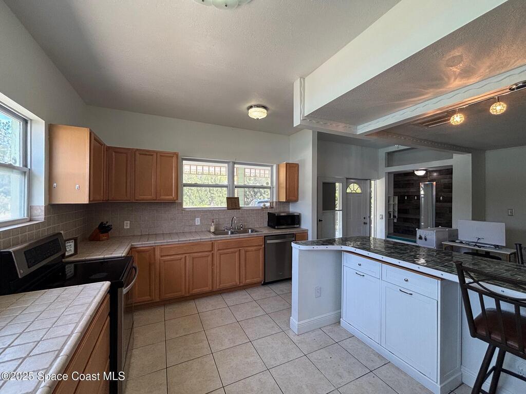 9590 Primrose Drive, Micco, FL 32976