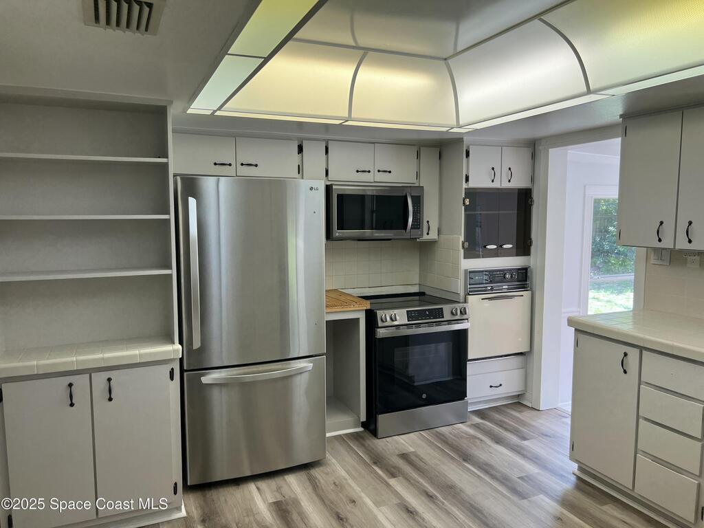 6031 Barna Avenue, Titusville, FL 32780