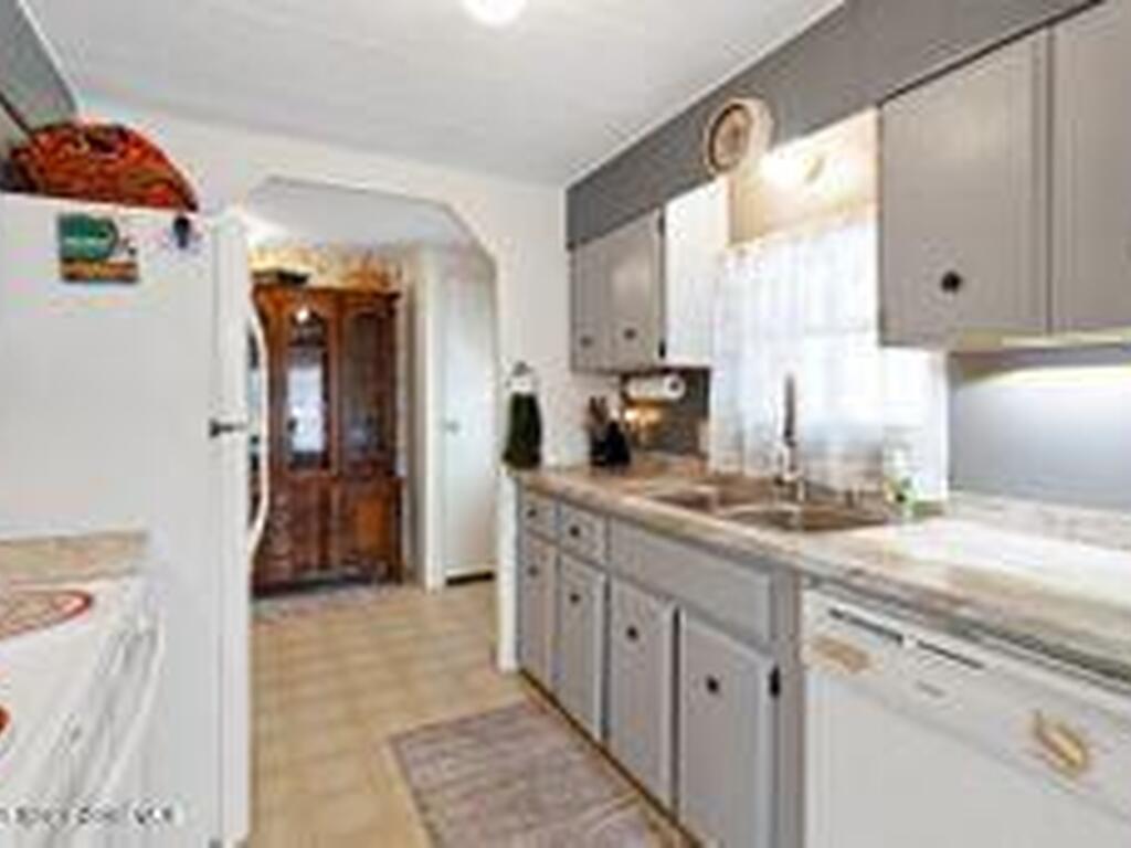 807 W Wren Circle, Barefoot Bay, FL 32976