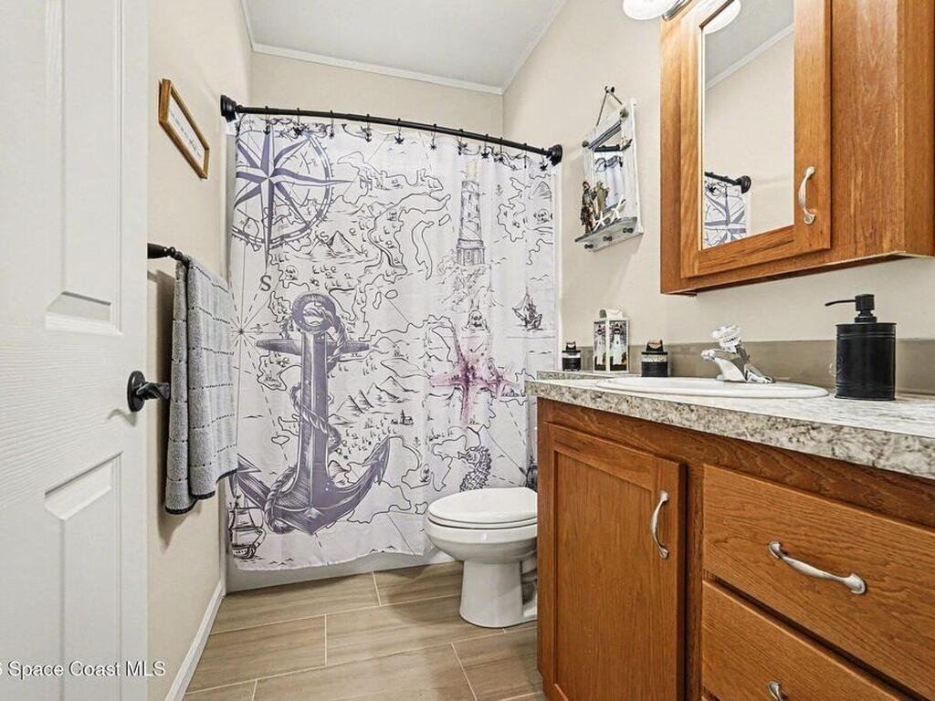 1067 Wren Circle, Barefoot Bay, FL 32976