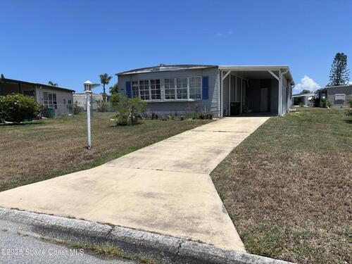 1161 Waterway Drive, Barefoot Bay, FL 32976
